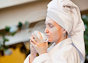 Young woman enjoyed with morning coffee photo