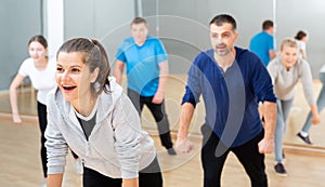 Young woman enjoying active dances