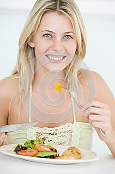 Young Woman Enjoying Healthy Meal