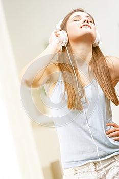 Young woman enjoying listening to her music