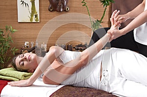 Young woman enjoying massage