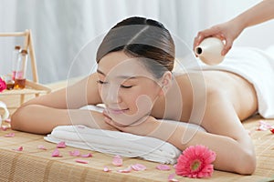 A young woman enjoying massage