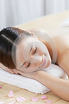 A young woman enjoying massage