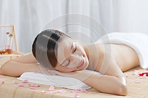 A young woman enjoying massage