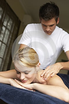 Young Woman Enjoying Massage