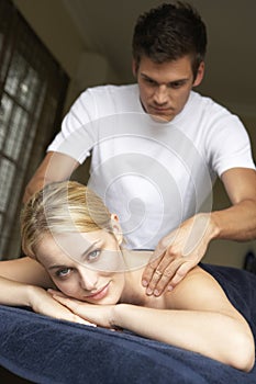 Young Woman Enjoying Massage