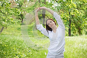 Young woman enjoying nature in a park