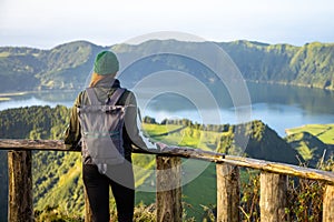 Young woman enjoying the scenic views of SÃ£o Miguel island in the Azores