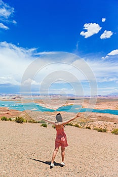 Young woman enjoying the view Lake Powell, Glen Canyon National Recreation Area