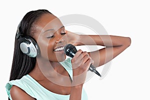 Young woman enjoys singing