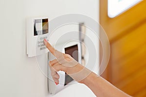 Young woman entering authorization code