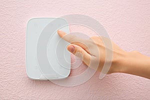 Young woman entering code