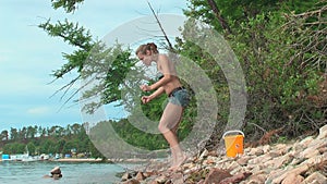 Young woman entering Lake Baikal