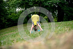 Young woman exercing in nature