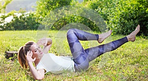 Young woman exercising outdoors in nature