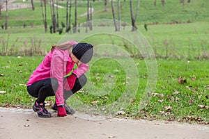 Young woman exhausted after running photo