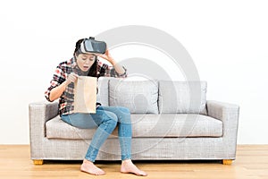 Young woman experiencing 3D game getting dizziness