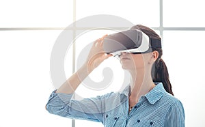 Young woman experiencing virtual reality