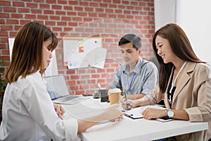 Young woman explaining in a job interview. Concept of job hunting and applying for new jobs