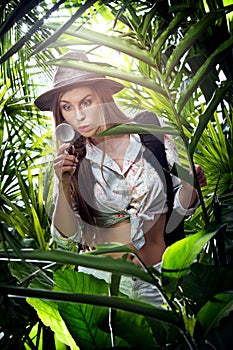 Young woman exploring jungle environment