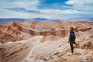 Young Woman Exploring the Moon Valley in the Atacama Desert, Chile, South America