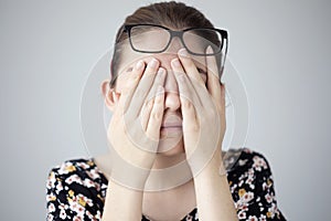 Young woman with eye fatigue