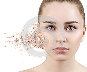 Young woman face made from crumbly powder.