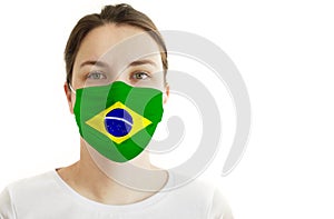 Young Woman in Face Mask with Brazilian Flag