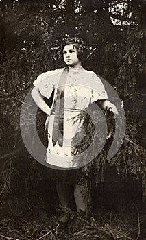 Young woman in a fairy tale costume in the forest. Retro, vintage. Rostov, USSR - circa 1930s