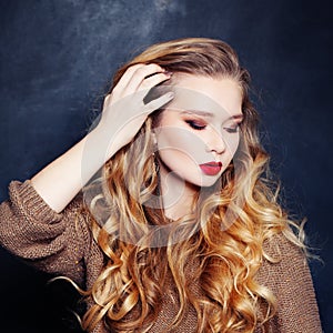 Young Woman Fashion Mode with Curly Blonde Hair