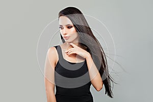 Young Woman Fashion Model with Long Healthy Hair