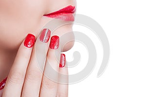 Young woman with fashion red nails and lips