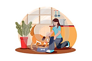 Young Woman Feeding Her Dog