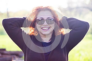 Young woman feeling happy and laughing photo