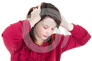 Young woman feeling stressed hands on head in white background