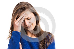 Young woman feeling strong head ache