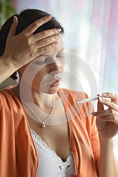 Young woman feels sickness