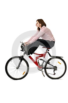 Young woman feet in the air on bycicle photo