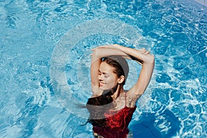 Young woman female beauty pool summer water body lifestyle blue person