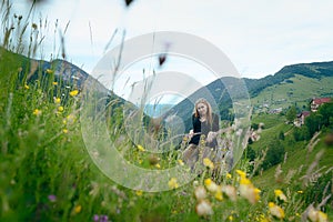 Young woman in a field of flowers