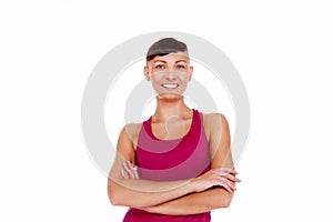 Young woman in fitness outfit isolated over white background smi