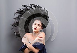 Young woman with floating hair photo