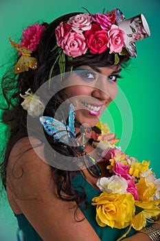 Young woman with floral wig