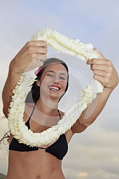 Young woman with a flower lei