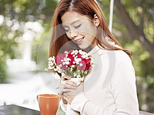 Young woman with flowers