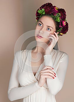 Young woman with flowers crown