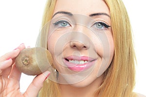 Young woman with fresh kiwi fruit