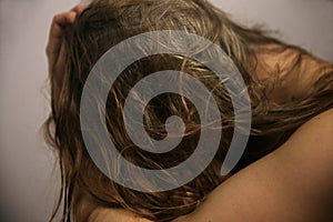 Young woman in front of the camera at a photo shoot