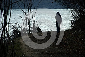 Young Woman in Front of a Lake