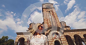 Young Woman in Front of Saint Mark Church in Downtown Belgrade, Serbia